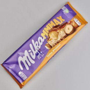 Шоколад MILKA Toffee Wholenut, 300г 03759 фото