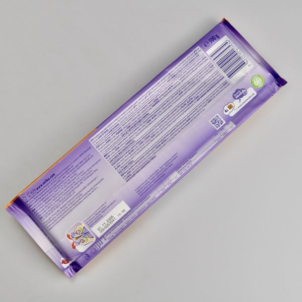 Шоколад MILKA Toffee Wholenut, 300г 03759 фото